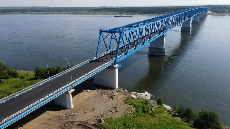 В Красноярском крае заасфальтировали Высокогорский мост и подходы к нему